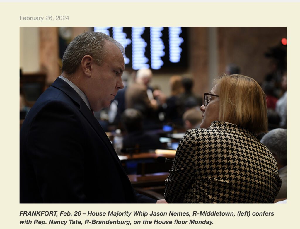 Two Kentucky state representatives talking.